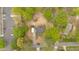 An aerial view of the property highlighting its location among lush trees in a residential neighborhood at 484 Lorene Sw Dr, Marietta, GA 30060