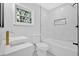 Modern bathroom featuring a unique sink, sleek fixtures, and stylish tile in the shower at 484 Lorene Sw Dr, Marietta, GA 30060