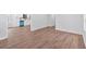 Open-concept area with new floors, a large kitchen, and neutral walls at 484 Lorene Sw Dr, Marietta, GA 30060