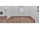 Living room area showcasing stylish flooring and neutral color scheme at 484 Lorene Sw Dr, Marietta, GA 30060