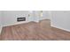 Living room with new floors, fireplace, neutral walls, and bright natural light at 484 Lorene Sw Dr, Marietta, GA 30060