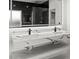Modern bathroom with double vanity, marble countertop, and black hardware at 859 N Bay Overlook, Villa Rica, GA 30180
