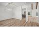A modern dining room featuring stylish chandelier and wood floors at 859 N Bay Overlook, Villa Rica, GA 30180