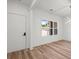 Bright entryway featuring wood floors, a large window, and a view to the outside at 859 N Bay Overlook, Villa Rica, GA 30180