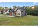 Charming two-story home featuring a two-car garage, landscaped yard, and tasteful brick and siding accents at 859 N Bay Overlook, Villa Rica, GA 30180
