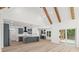 Beautiful open-concept kitchen with large island, sleek blue cabinetry, and access to an outdoor area at 859 N Bay Overlook, Villa Rica, GA 30180