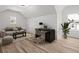 Comfortable living room featuring hardwood floors, bright walls and natural light at 859 N Bay Overlook, Villa Rica, GA 30180