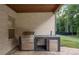 Stainless steel outdoor grill and sink on a brick patio at 859 N Bay Overlook, Villa Rica, GA 30180
