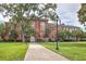 Beautiful brick building with a well-manicured lawn and sidewalk at 2407 Malster Ln, Lawrenceville, GA 30043