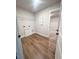 Functional laundry room with shelving, providing ample space for laundry tasks at 2407 Malster Ln, Lawrenceville, GA 30043