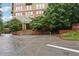 The entrance to the building features modern architecture, lush landscaping and convenient parking at 2626 Peachtree Nw Rd # 1108, Atlanta, GA 30305