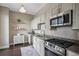 Well-equipped kitchen with stainless appliances and sleek, light cabinetry at 2626 Peachtree Nw Rd # 1108, Atlanta, GA 30305