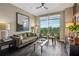 Cozy living room featuring a balcony with views and comfortable seating at 2626 Peachtree Nw Rd # 1108, Atlanta, GA 30305