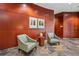 Inviting lobby with wood accent wall, slate floor, and comfortable seating near artwork at 2626 Peachtree Nw Rd # 1108, Atlanta, GA 30305