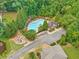 Aerial shot of the community pool with surrounding trees at 3260 Caney Creek Ln, Cumming, GA 30041