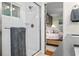 Updated bathroom featuring glass shower doors, white subway tile, and neutral gray towels at 3317 Embry Hills Dr, Atlanta, GA 30341