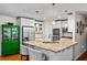 Modern kitchen features granite countertops, stainless steel appliances, and custom cabinets providing ample storage at 3317 Embry Hills Dr, Atlanta, GA 30341