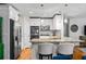 Kitchen with granite countertops, stainless steel appliances, and white cabinetry at 3317 Embry Hills Dr, Atlanta, GA 30341
