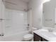 Well-lit bathroom showcasing a shower and tub, toilet, and sink at 3758 Lake Haven Way, Atlanta, GA 30349