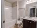 Clean bathroom featuring a tub and shower combination with a dark wood vanity at 3758 Lake Haven Way, Atlanta, GA 30349