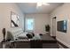 Comfortable bedroom with neutral tones, ceiling fan, and mounted television at 3758 Lake Haven Way, Atlanta, GA 30349