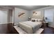 Comfortable bedroom with neutral colors, stylish decor, and lots of light at 3758 Lake Haven Way, Atlanta, GA 30349