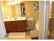 Well-lit primary bathroom with double vanity, garden tub, and separate shower at 5230 Centennial Hill Nw Dr, Acworth, GA 30102