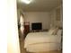 Comfortable bedroom with soft bedding, decor and natural light at 5230 Centennial Hill Nw Dr, Acworth, GA 30102