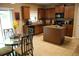 Bright kitchen and breakfast area with a center island, granite countertops and stainless appliances at 5230 Centennial Hill Nw Dr, Acworth, GA 30102