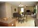 Open-concept living area with neutral colors and an adjacent dining space at 5230 Centennial Hill Nw Dr, Acworth, GA 30102