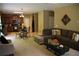 Spacious living room with an open floor plan, a fireplace, and easy access to the kitchen at 5230 Centennial Hill Nw Dr, Acworth, GA 30102