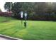 Community green space with pet waste station, 'no parking' sign and pet route sign at 5230 Centennial Hill Nw Dr, Acworth, GA 30102