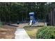 Community playground featuring swings, slides, and soft ground cover, for outdoor fun at 5230 Centennial Hill Nw Dr, Acworth, GA 30102