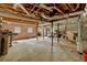 Unfinished basement with exposed ductwork, providing potential for customization and additional living space at 597 Rich Davis Rd, Hiram, GA 30141