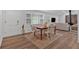 Spacious dining room with hardwood floors, ample natural light, and comfortable seating at 597 Rich Davis Rd, Hiram, GA 30141