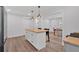 Bright, open kitchen featuring a butcher block island with pendant lights and stainless steel appliances at 597 Rich Davis Rd, Hiram, GA 30141