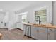 Charming kitchen has stainless steel appliances, butcher block countertops, and ample natural light at 597 Rich Davis Rd, Hiram, GA 30141