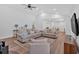 Bright living room boasts an open layout with hardwood floors, neutral colors, and recessed lighting at 597 Rich Davis Rd, Hiram, GA 30141