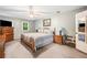 Bedroom featuring carpet, a ceiling fan, and natural light from a window at 6360 Lakeview Ter, Douglasville, GA 30135