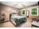 Bedroom featuring carpet, a ceiling fan, and a window with natural light at 6360 Lakeview Ter, Douglasville, GA 30135