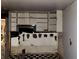 Kitchen needing remodel, highlighting aged shelves and missing drywall at 3008 Grand Sw Ave, Atlanta, GA 30315