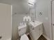 Cozy bathroom featuring a vanity with storage, a toilet, and neutral-colored walls at 7054 Chappell Cir, Atlanta, GA 30360