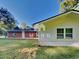 Exterior view of a house and a grassy yard at 7054 Chappell Cir, Atlanta, GA 30360