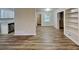 Spacious living room featuring open floor plan and direct access to the kitchen at 7054 Chappell Cir, Atlanta, GA 30360