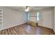 Bright living room featuring hardwood floors and a cozy fireplace at 7054 Chappell Cir, Atlanta, GA 30360
