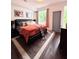 Bedroom featuring a queen bed, window and outdoor access at 1463 Macklone Ne St, Atlanta, GA 30307