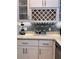 Chic kitchen with white cabinets, granite countertops, and decorative wine rack at 1463 Macklone Ne St, Atlanta, GA 30307