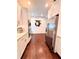 Modern kitchen with stainless steel appliances, white cabinets, and sleek countertops at 1463 Macklone Ne St, Atlanta, GA 30307