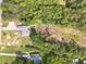 Birds-eye view of a property featuring a home with large yard and mature trees in a serene setting at 1623 Pratt Rd, Covington, GA 30014