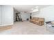 Basement rec room with plush seating and fitness area at 1623 Pratt Rd, Covington, GA 30014